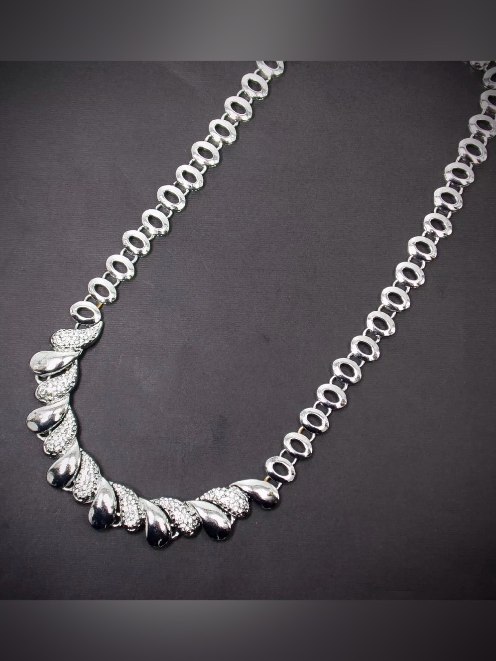 Silver and crystal dressy necklace with swirl design front oval link neck New